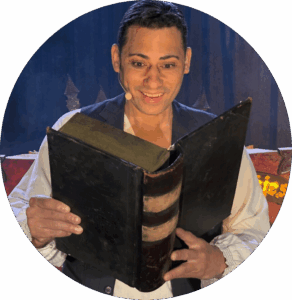 Aires leest in zijn magische toverboek